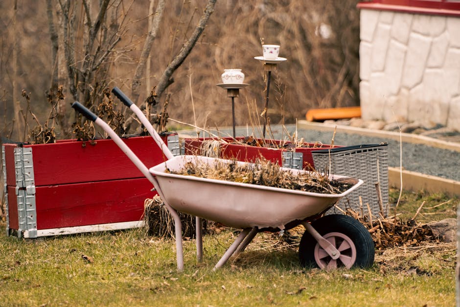 A vintage wheelbarrow filled with dried plants, set in a charming outdoor garden scene in Sweden.